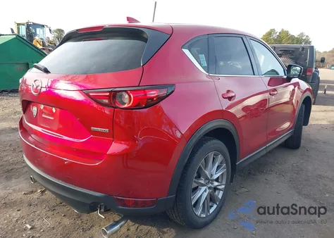 2021 Mazda Cx-5 Grand Touring from USA, damaged, VIN JM3KFADM9M0313524